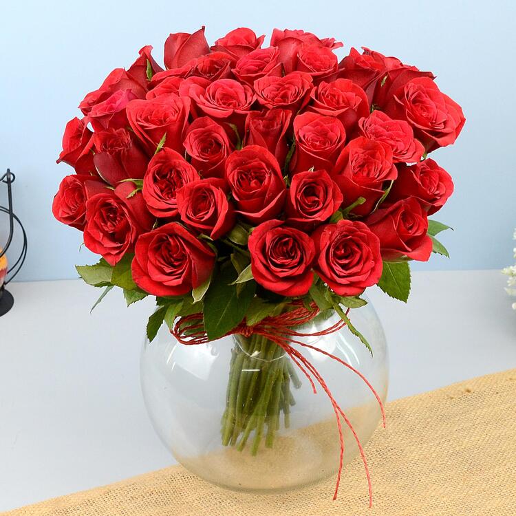 Bright Red Roses In A Vase